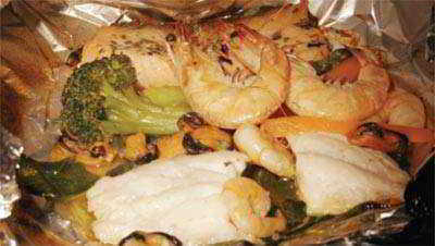Receta para hacer Papillote de pescado, marisco y verdura
