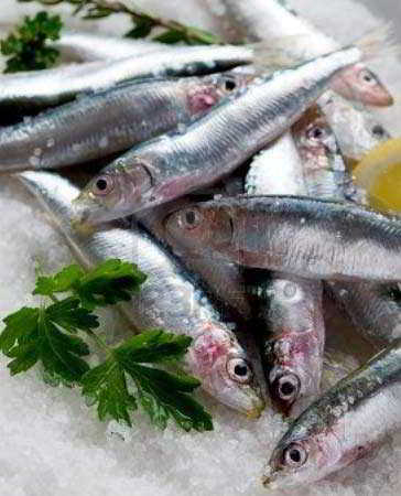 Receta para hacer Ensalada variada con sardinas en aceite de oliva